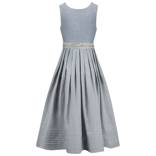blue dirndl dress with a belt on a white background