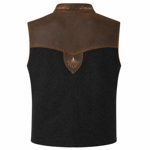 A sleeveless western-style vest with a black wool-like body, a brown leather yoke, and a matching brown shield-shaped patch with an engraved leaf design at the center back.