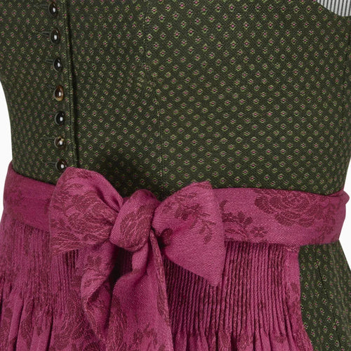 Green Dirndl dress close-up with a pink apron 
