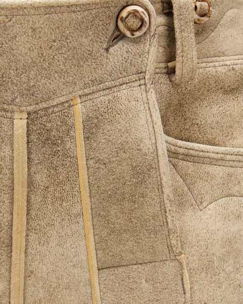 Close-up of beige fabric with stitching details