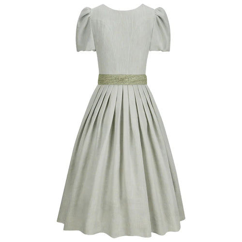 Light gray dress with a green belt on a white background