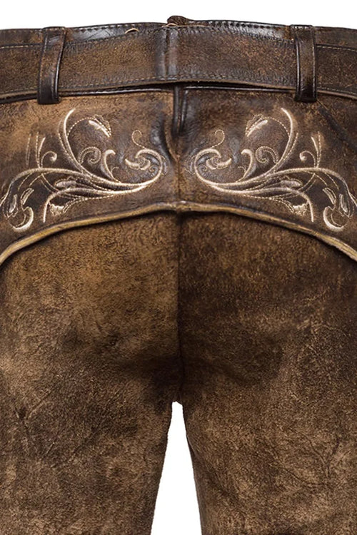 Brown leather pants with intricate white embroidery on a white background